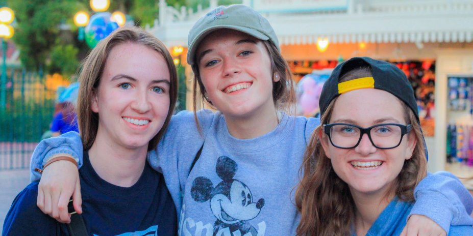Three Loyola Marymount University pre-college students pose during a trip to Disneyland.