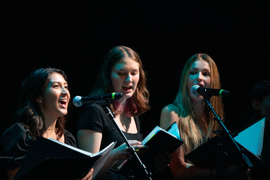 Students sing during an LMU performance
